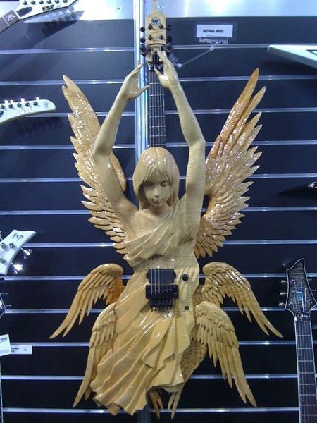 Фото Электрогитара ESP CUSTOM CARVED ANGEL